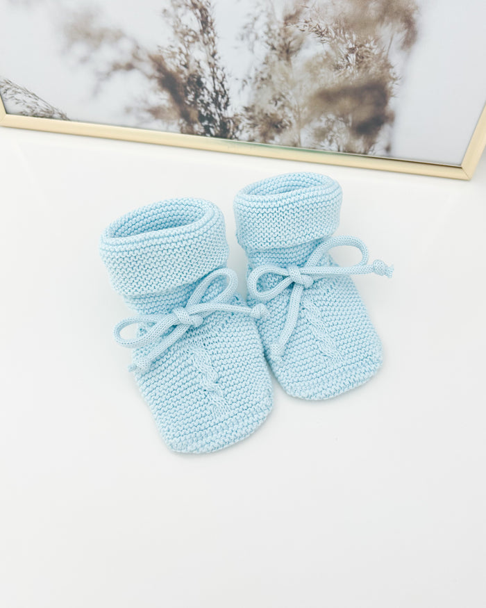 Chaussons bleu bébé