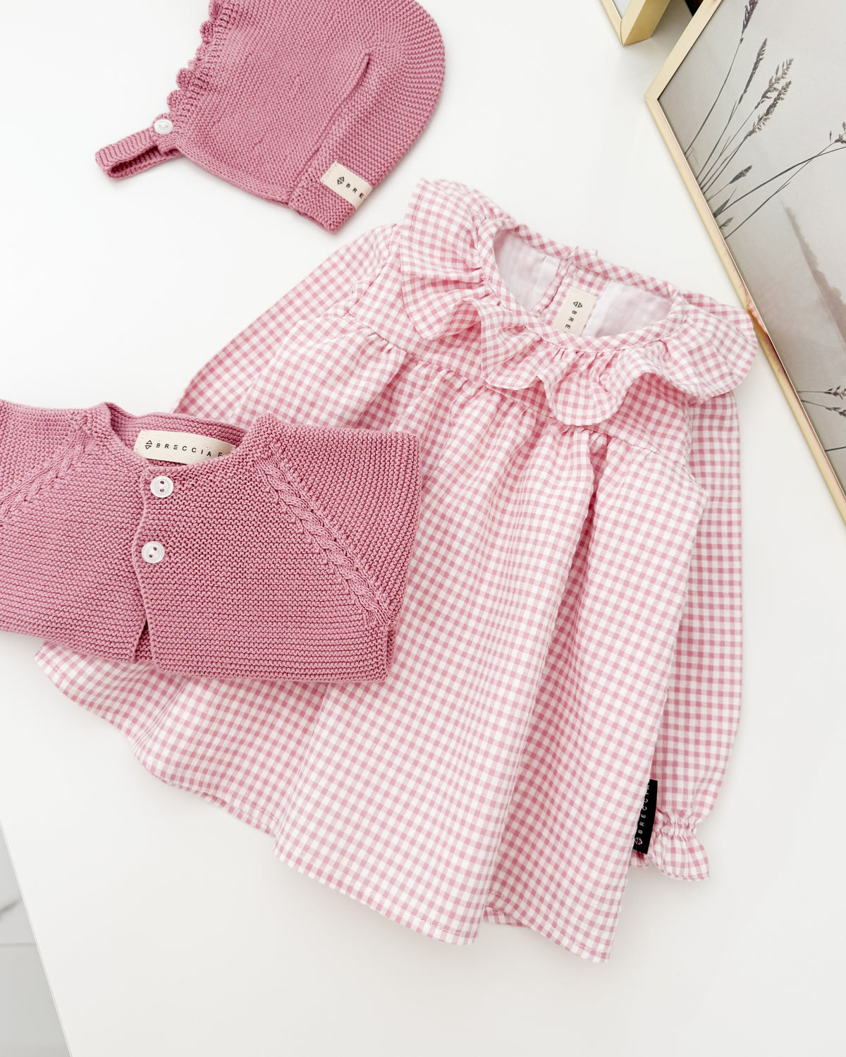 Abito a quadretti rosa pallido