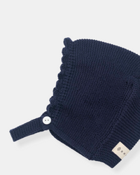 Navy blue knitted bonnet